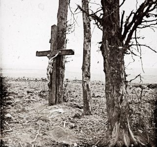 An image of Christ on the cross is seen at a grave by a tree at Fricourt in October 1916