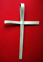 A cross woven from a palm leaf